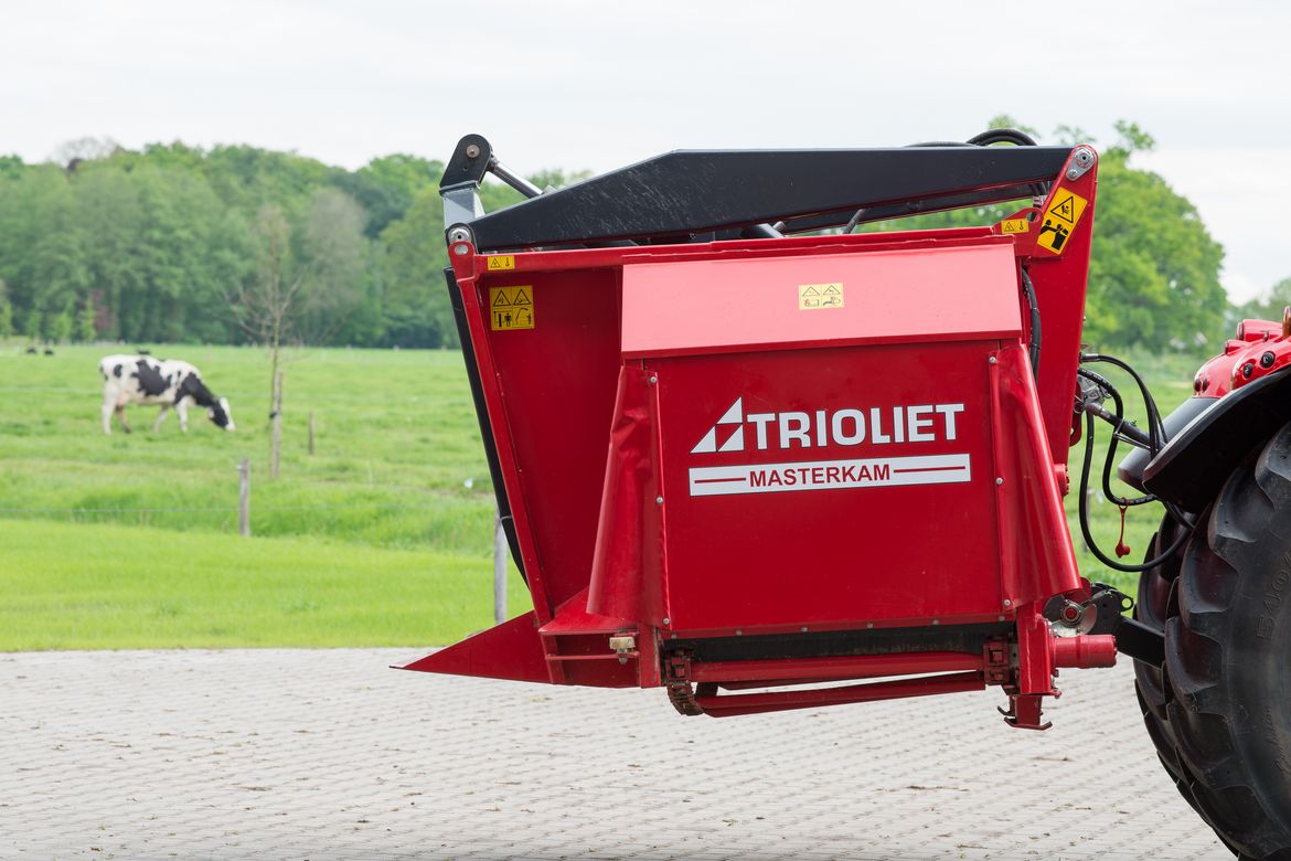 Autocargador distribuidor, carro alimentador